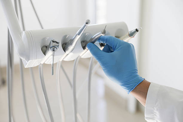 Professional Tooth Extraction technician working in Farley, KY